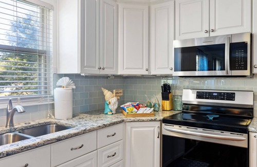 McAlpine House | Poolside Retreat - spacious 4-bedroom retreat with pool, hot tub, game room&more