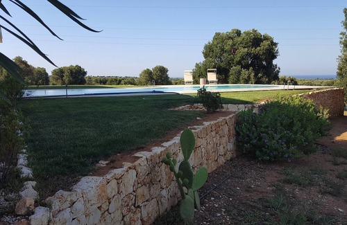 Serranova Villa | Poolside villa with a view among ancient olive trees