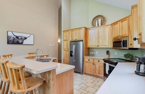 Nisswa House | Popular Interlachen Condo with Relaxing Creek Views & steps away from Gull Lake