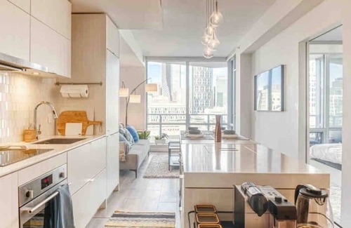 Bridgeland Condo | Postcard Views w/Chic Decor, Office, Parking