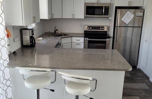 Admiral Estates Condo | Poverty Beach is right across the street from this newly renovated bright Beach Condo.