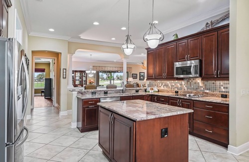 The Villages House | Premier Golf Course Home - includes Golf Cart and Covered Outdoor Kitchen!