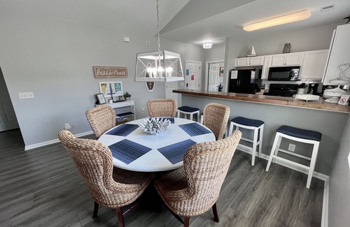 North Myrtle Beach Condo | Premier Golf Location - Barefoot Resort! Family/dog friendly - 2 pools/beach!