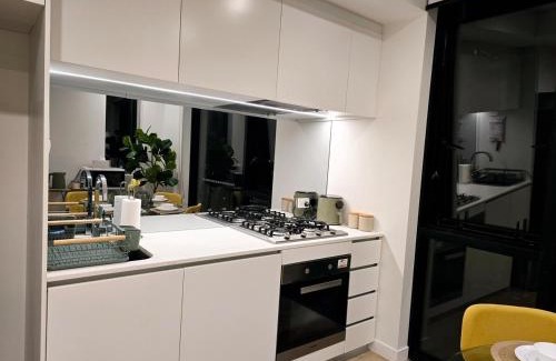 Spring Hill Apartment | Premium City Escape-Stunning Skyline Views