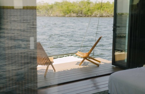 Key Largo House | Premium Floating Bugalow by Stay Ombi in the Keys with Stunning Ocean Views.