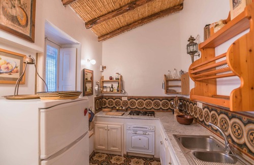 Lipari Historic Centre Apartment | Prestigious historic house with private garden, under the Lipari castle