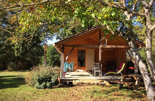 Espinas Cabin | Pretty cabin in beautiful gardens with wood stove & Nordic spa hot-tub/jacuzzi.