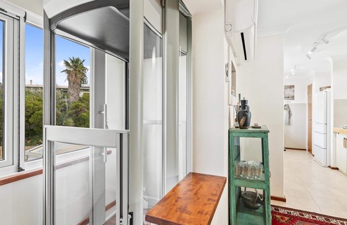 Halls Head Villa | PRIME BEACHFRONT. PRIME VIEWS. PRIME TIME. Elegance, with mobility elevator.