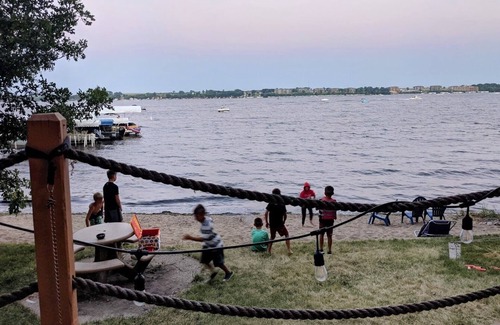 Okoboji Cabin | Prime East Lake beachfront cabin with boat hoist in Okoboji