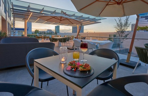 Providencia Hotel | Prime Location in Trendy Zone – Modern Room, Work Desk, and Local Charm