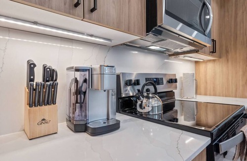 Main - Military Plaza Hotel | Prime Location Near Tower of the Americas | Modern Living w/Kitchen & Washer