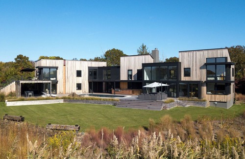 North Sea House | Pristine 6-bedroom waterfront property with a private dock in Southampton