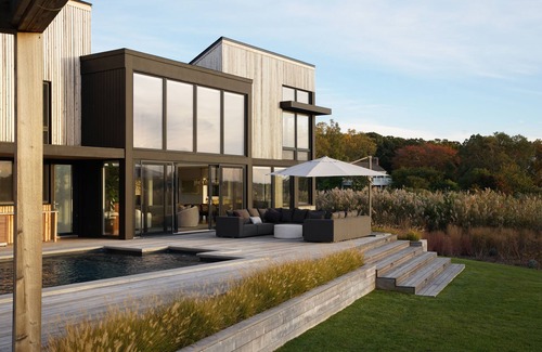 North Sea House | Pristine 6-bedroom waterfront property with a private dock in Southampton