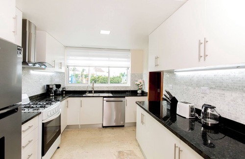El Cortecito Apartment | Pristine Beach with Crystal-clear water for your getaway. 4BR, Pool, Rooftop.