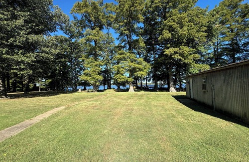 Samburg House | Pristine Lakefront Home has lots of space and amazing views.