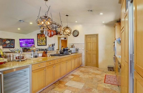 Enterprise House | Private 3/4 acre Custom Home Heated Pool/Spa & Waterfall-Close to Strip!