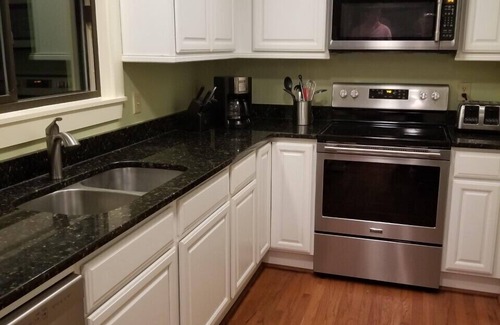 West Beach Cottage | Private 3 Bdrm Oceanwoods home short walk to the beach wifi deck and grill.
