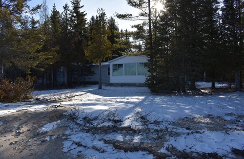 Carp Lake Cottage | Private and secluded lakefront 15 Minutes From Mackinaw City