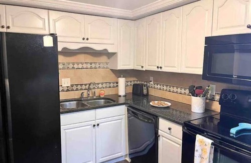 Pensacola Beach House | Private balcony overlooking a lagoon and only a block to the Beach!