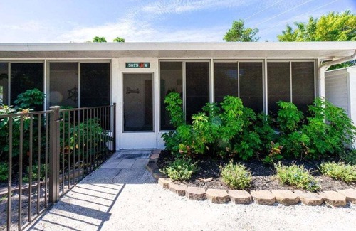 Englewood House | Private beach, bay access to only 5 homes, dog friendly, fenced yard, steps to the water on either side