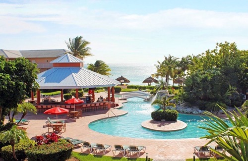 Williams Town Resort | Private beach, beautiful free-form pool, hot tubs, gym and relaxing spa.