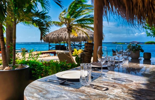 De Bruynewijk Villa | Private Beach Ocean Front Boat Dock Tiki Bar