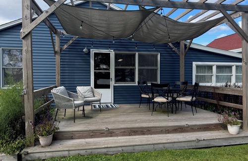 Onekama Apartment | Private beachfront 2BR w deck and firepit in Onekama