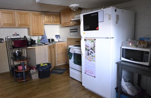 Calgary House | Private bedroom in basement suite - Pineland