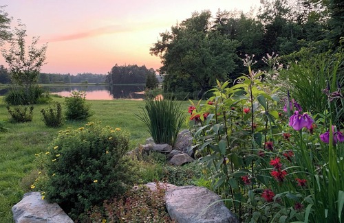 Clare Ski Chalet | Private cottage on 8 wooded and flower-filled acres at Lake Wentworth and the Wentworth River