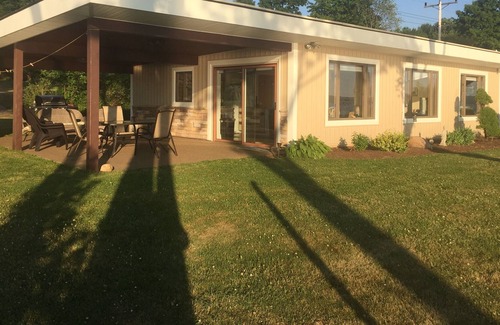 Niobe Cottage | Private Cottage on 80 Feet of Prime Lakefront-Stunning Sunsets.