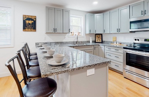 Brownfield House | Private, dog-friendly retreat with a game room, firepit, grill, jetted tub, & AC