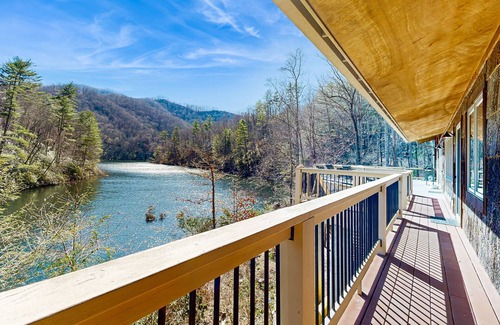 Tuckasegee House | Private eco-retreat with screened porch, play area, & wood stove