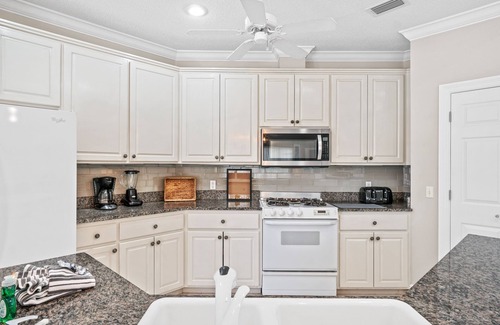 Upper Grand Lagoon House | Private Home with Pool | East End PCB, Minutes to Beaches & Dining