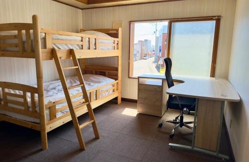 Tobetsu Apartment | Private house Oheso 40minutes from Sapporo,4 free parking, long stay,16people