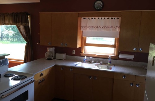 Crystal Falls House | Private Lake House on 16 +/- wooded acres, 80 + acre lake, 55 foot deep!