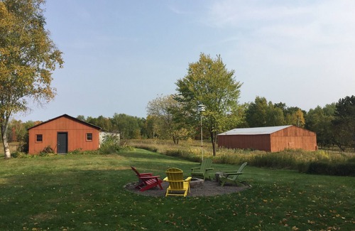 Markville Cabin | Private, modern, cedar log cabin home on twenty acres near St. Croix State Park.