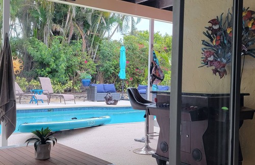 Iona House | Private Oasis in quiet neighborhood heated pool and spa surrounded palms.