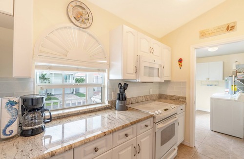Mid Island House | ☀️Private Pool | Canal Front Home with Boat Dock | Beach Bound☀️