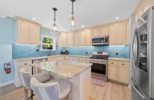 Cocoa Beach House | Private Resort Style Home w/Heated Pool and Hot Tub - 5 min walk to Cocoa Beach