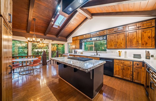 Oakhurst House | PRIVATE RESORT STYLE RIVERFRONT ESTATE W/TENNIS COURT, POOL, SPA, WATERFALLS.