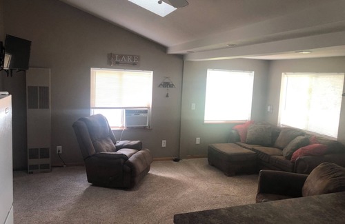 Spruce Cottage | Private sandy beach on Hubbard Lake South Shore