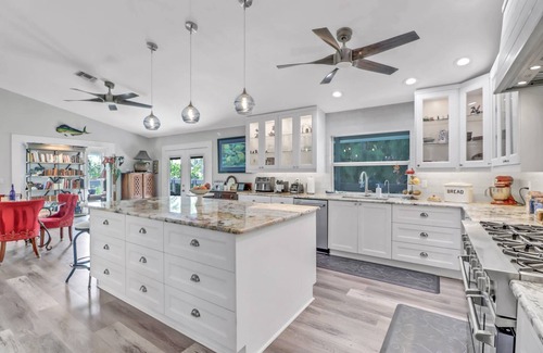 Truckland House | Private, Secluded, Close to Beach! Heated Pool! 2 Living Spaces! Over $125 Free Daily Activities!
