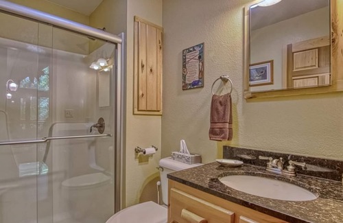 Hayward House | Private, spacious cabin with wrap-around deck, chef's kitchen, fireplace, & AC