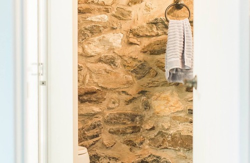 Goodville Other | Private suite with kitchenette, bedroom, bathroom and patio.