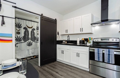 Beverly Green House | Private Vegas Oasis: Prime Location, Patio & Games