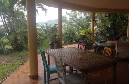 Tartane House | Private villa with flower garden facing the sea