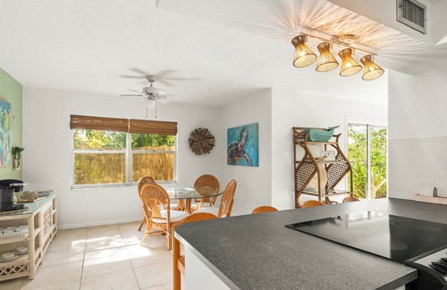 River Isles House | Private wooded 3BR/3BA house w/heated pool on canal just steps from beach