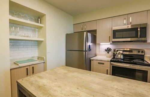 Isle of Palms Condo | Professionally Decorated Corner Condo with Ocean Views, Covered Balcony & Access to Community Pool