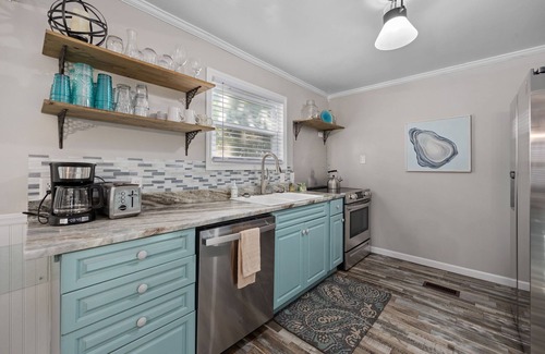 Garden City House | Pura Vida 4 Blocks 2 Sea Fire Pit Golf Cart Option