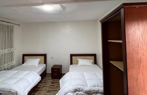 Giza Hotel | pyramids view inn To Pyramids , 4-bedroom hotel with AC and WiFin tranquil Giza